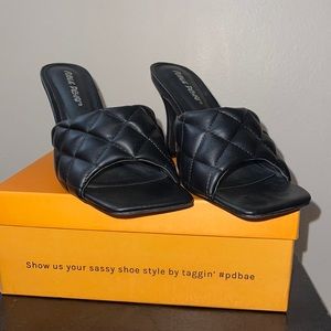 Black heeled sandals/ mules